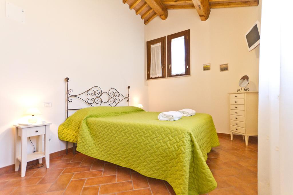 La Fattoria Di Tirrenia Lejlighedshotel Værelse billede